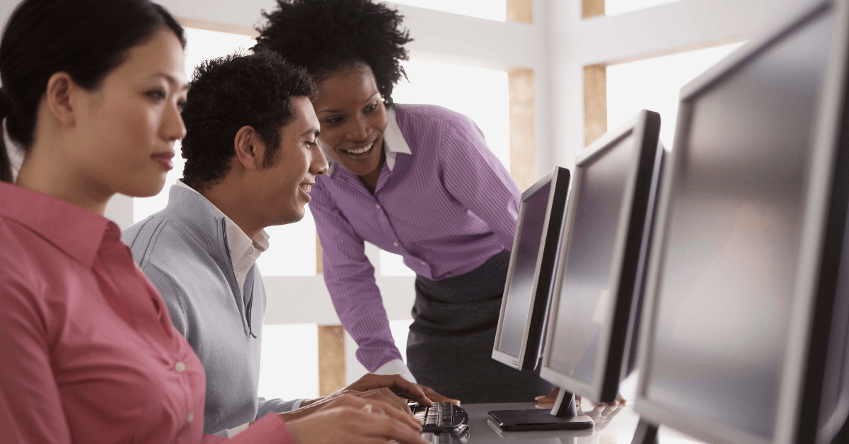 Image of corporate training session involving computer guidance